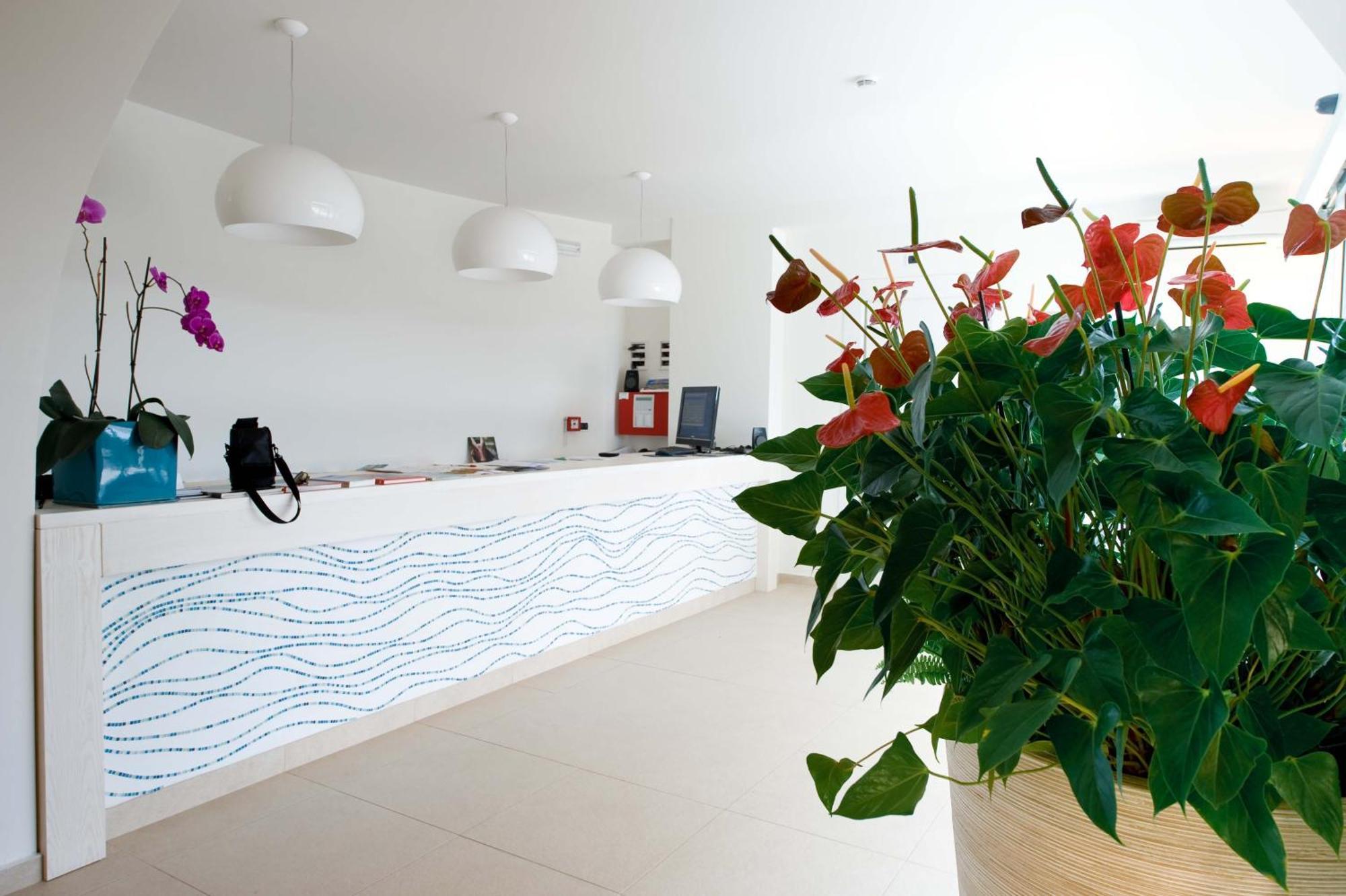 Hotel Cala Reale Стинтино Екстериор снимка